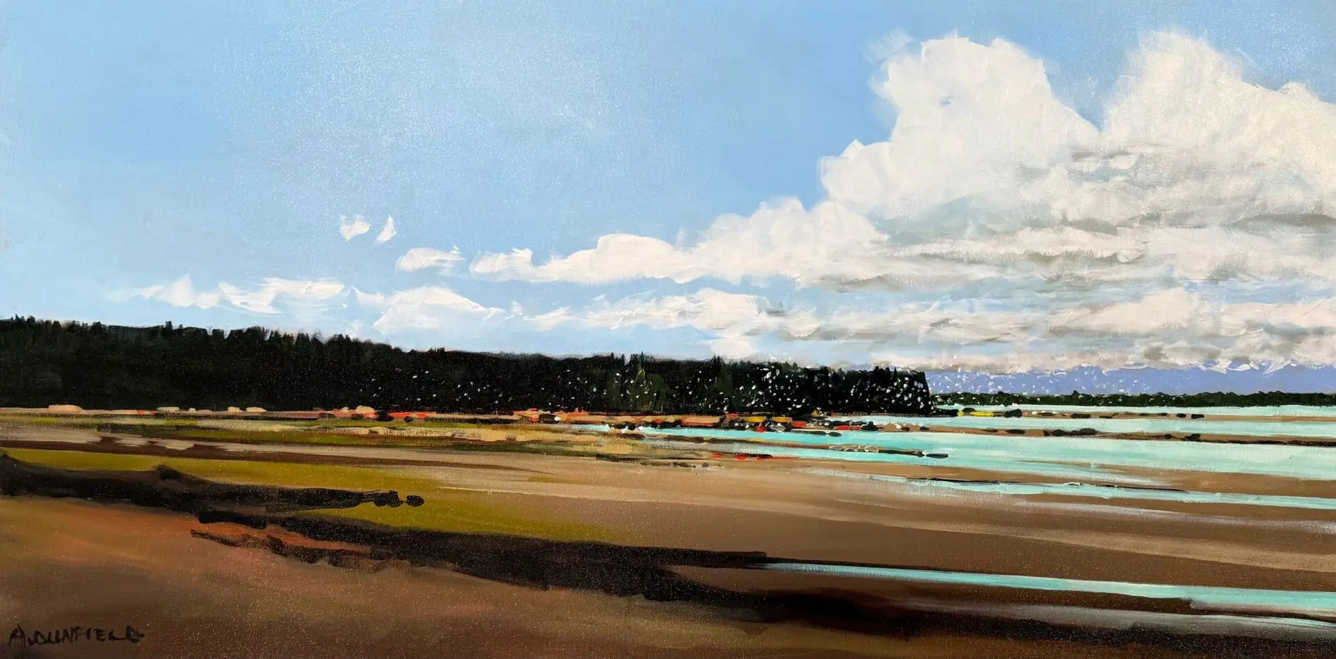 Coastal landscape with blue sky and clouds.