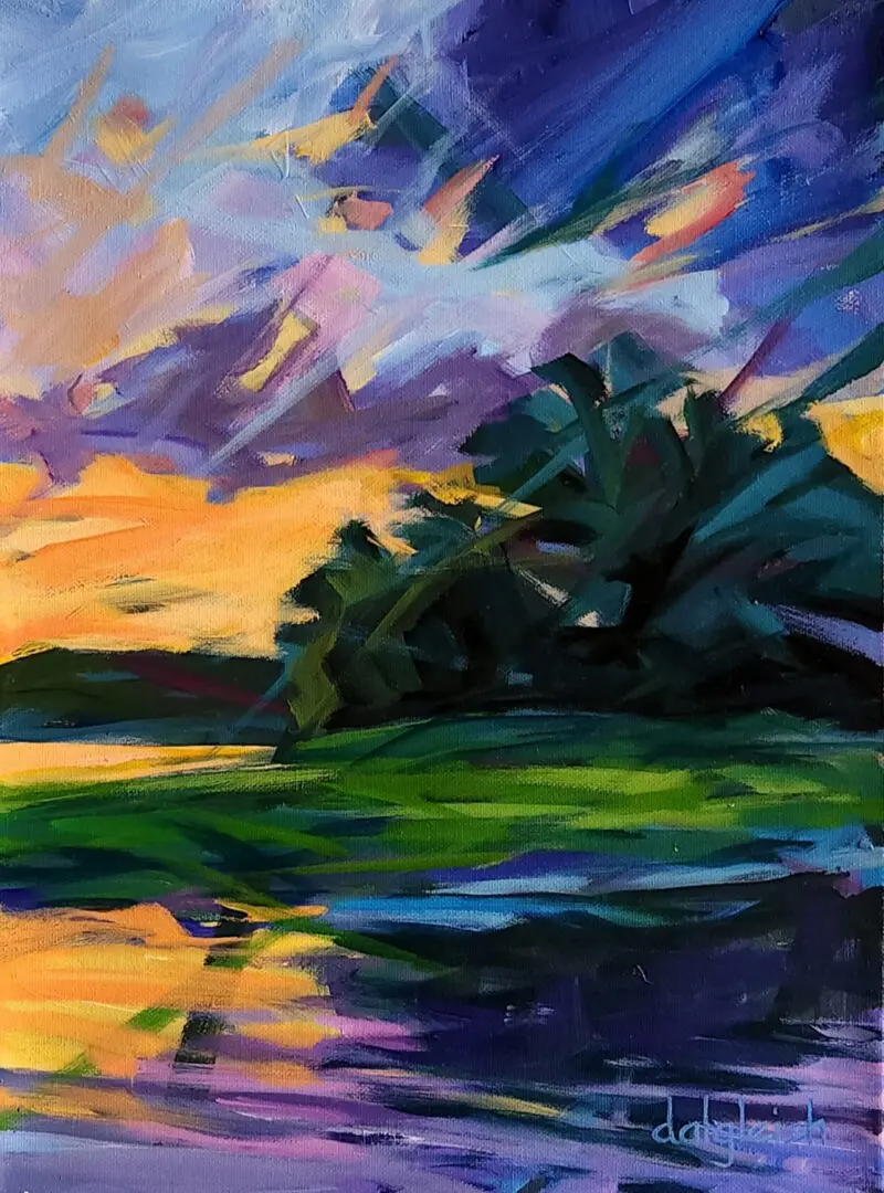 Vivid sunset reflecting on tranquil water.