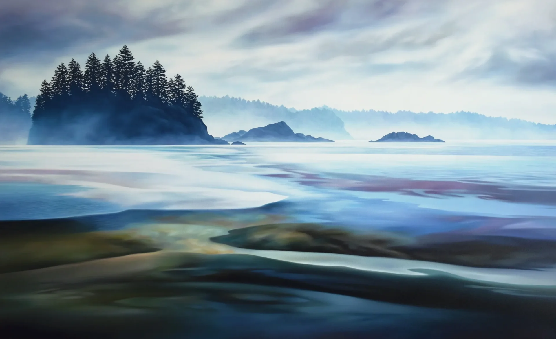 Misty seascape with islands and cloudy sky.